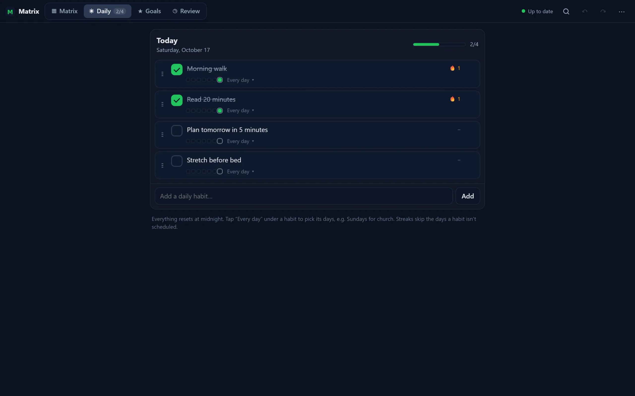 Daily habits view with a two-of-four progress bar and streak markers
